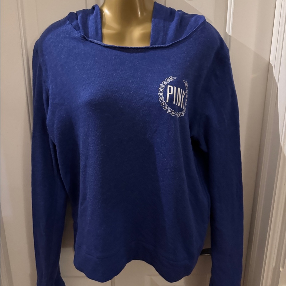 PINK colbolt blue color, long sleeve hoodie top. Graphics on front. Medium